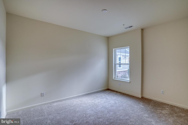 view of carpeted spare room