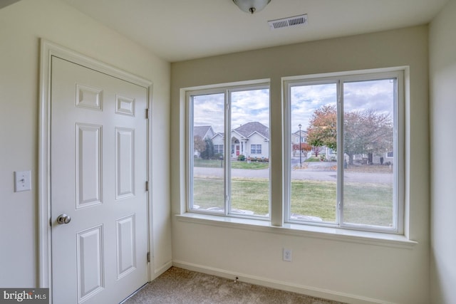 interior space with light colored carpet