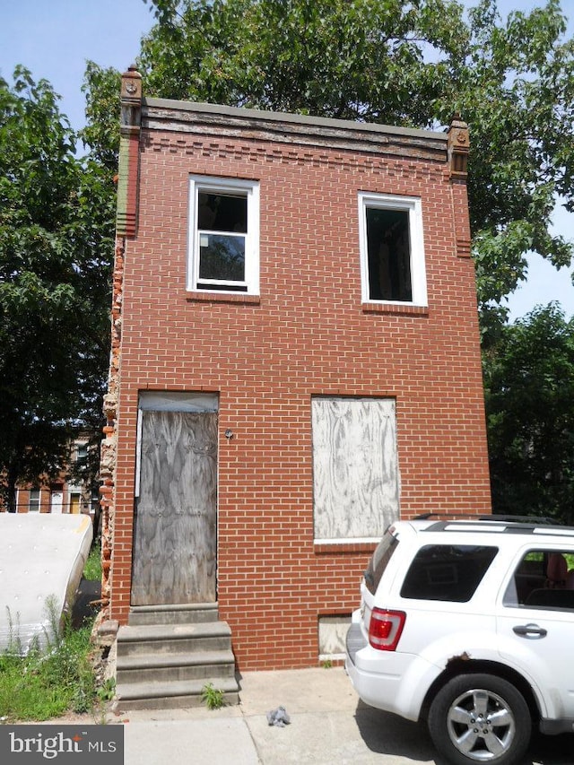2440 N Corlies St, Philadelphia, PA 19132 - front facade featuring entry steps and brick siding