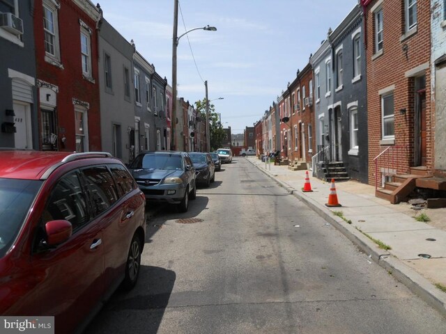 2440 N Corlies St, Philadelphia, PA 19132 - view of street with street lights, sidewalks, a residential view, and curbs