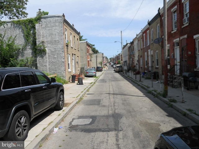 2440 N Corlies St, Philadelphia, PA 19132 - view of asphalt street featuring sidewalks, curbs, and street lighting