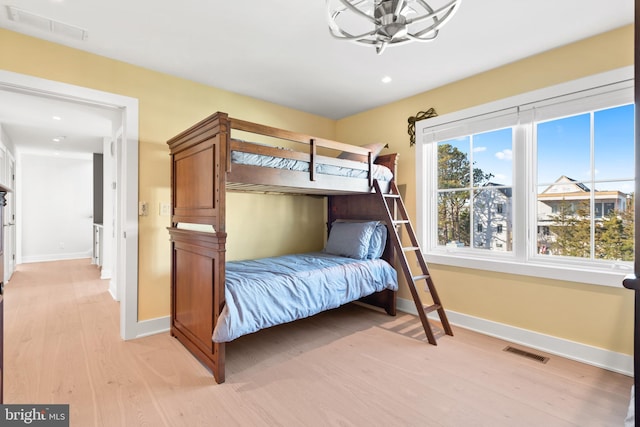 bedroom featuring light hardwood / wood-style floors