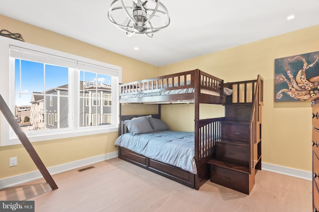 bedroom with light hardwood / wood-style flooring