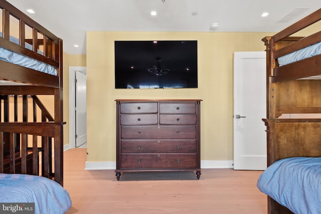 bedroom with light hardwood / wood-style floors