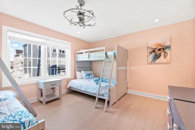 bedroom with light hardwood / wood-style floors