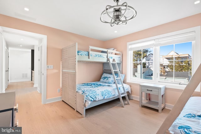 bedroom featuring light wood-type flooring