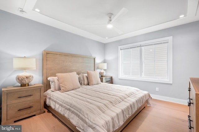 bedroom featuring ceiling fan and light hardwood / wood-style floors