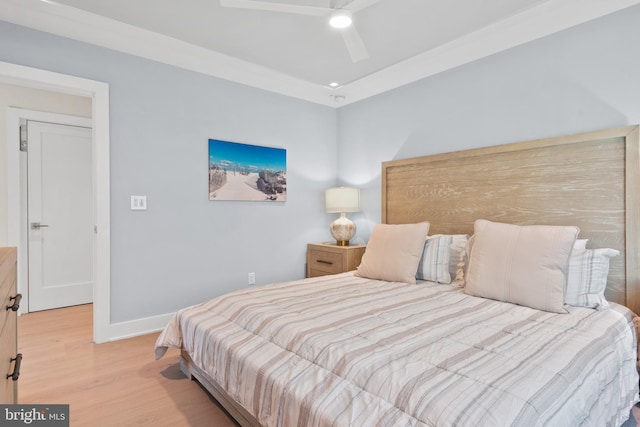 bedroom featuring light wood-type flooring and ceiling fan