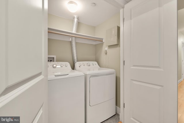 washroom with separate washer and dryer