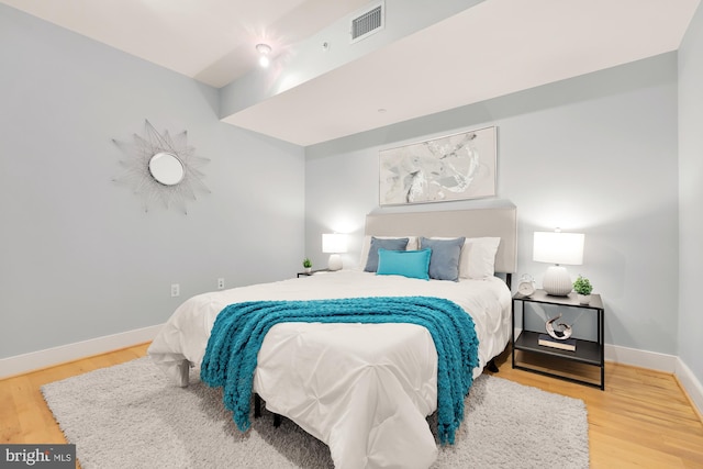 bedroom featuring wood-type flooring