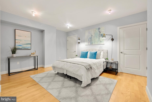 bedroom featuring light hardwood / wood-style floors