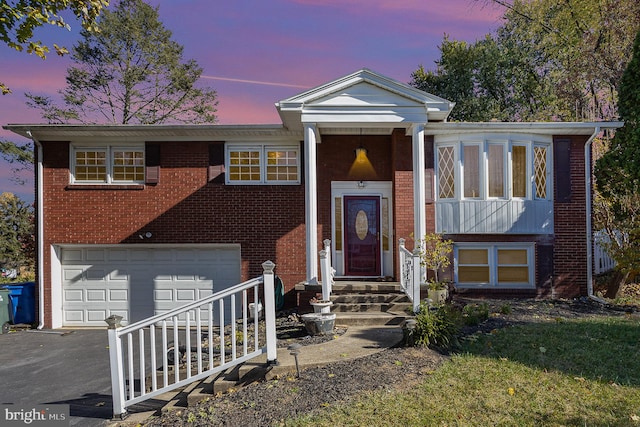 view of front of home featuring a garage