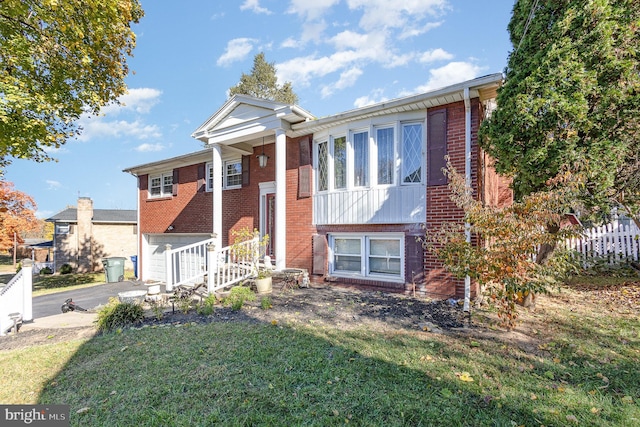 view of front of home with a front yard