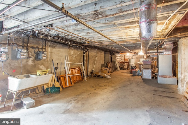 basement featuring gas water heater