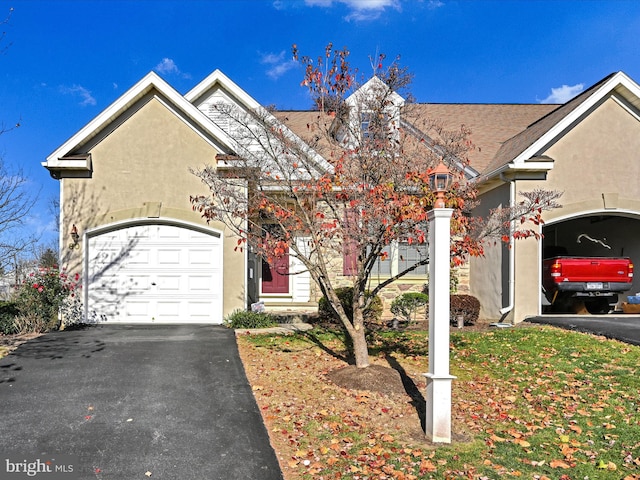 view of front of home with a garage