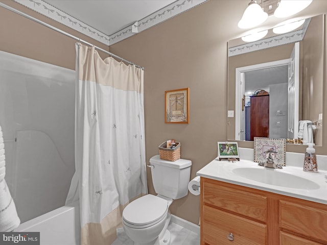 full bathroom featuring toilet, vanity, and shower / bath combination with curtain