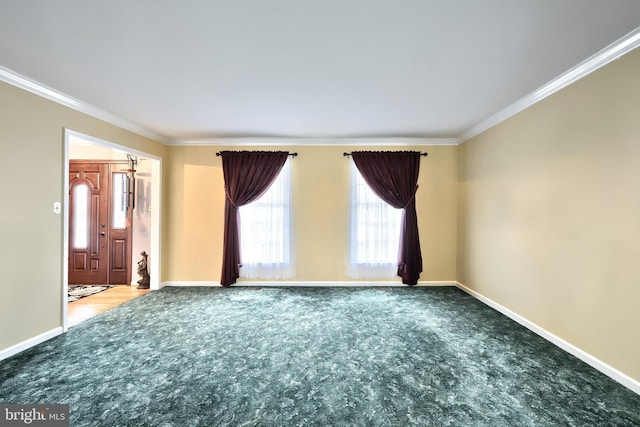 carpeted empty room with crown molding