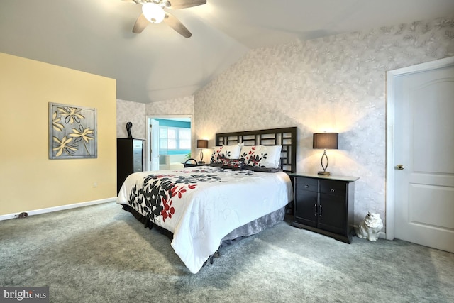 carpeted bedroom with ceiling fan and lofted ceiling