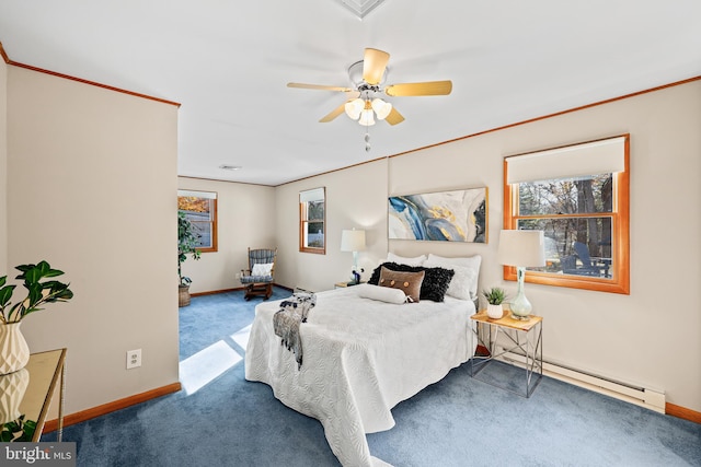 carpeted bedroom featuring baseboard heating, ceiling fan, and crown molding