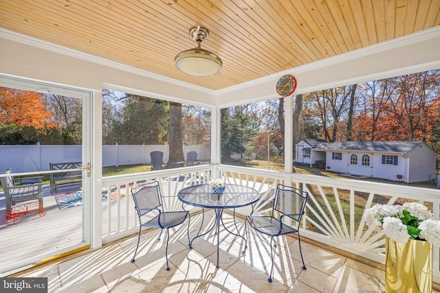 sunroom with wood ceiling