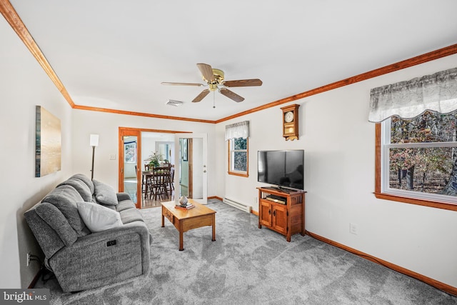 living room featuring ceiling fan, carpet flooring, a baseboard heating unit, and ornamental molding