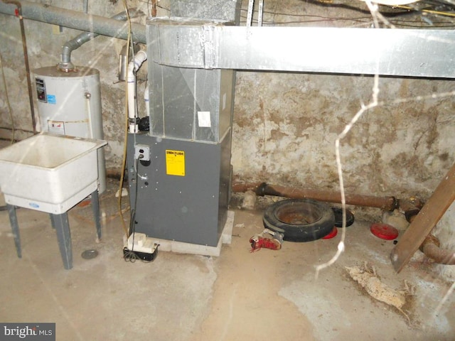 utilities featuring water heater and heating unit