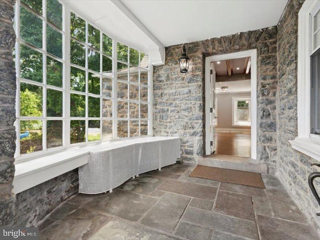 view of unfurnished sunroom