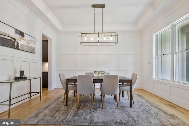 dining area with wood-type flooring