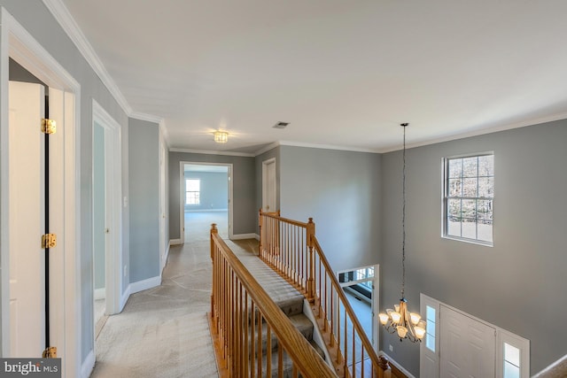 corridor with light carpet and crown molding