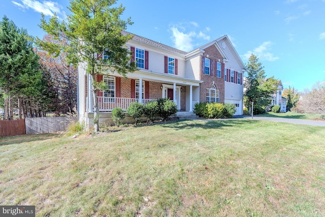 view of front of property with a front lawn and covered porch