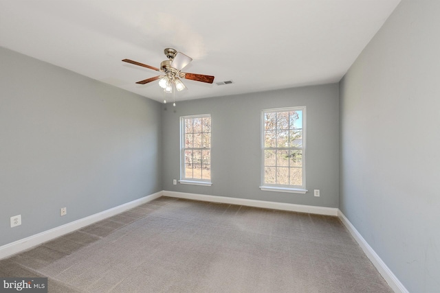 empty room with light carpet and ceiling fan