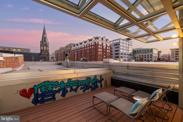 view of balcony at dusk