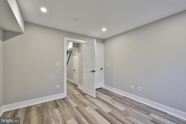 unfurnished bedroom featuring light hardwood / wood-style flooring