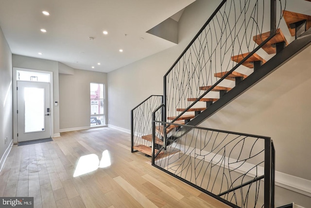 foyer with light hardwood / wood-style flooring