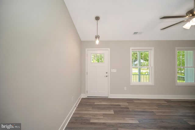 entrance foyer with dark wood-type flooring, vaulted ceiling, and ceiling fan