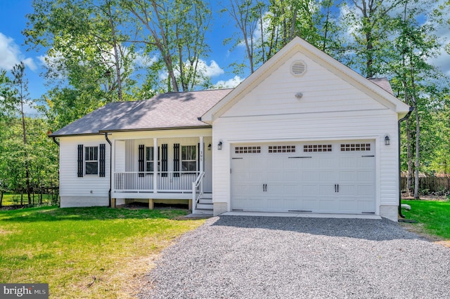 ranch-style home featuring covered porch, a garage, and a front lawn