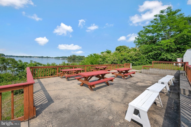 view of patio / terrace with a water view