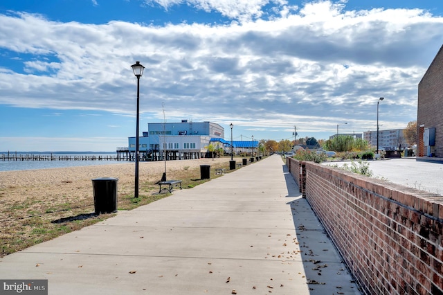 view of home's community with a water view