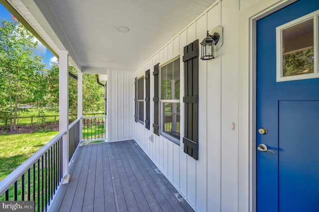 wooden terrace with covered porch