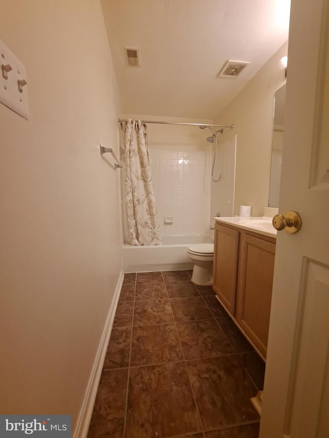 full bathroom with tile patterned floors, shower / bath combination with curtain, toilet, and vanity