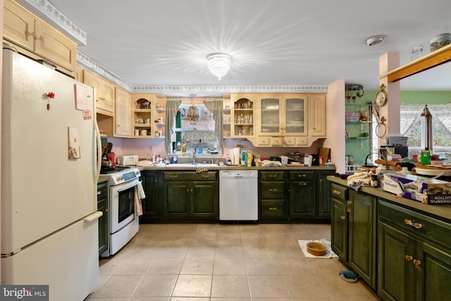 kitchen with light tile patterned floors and white appliances