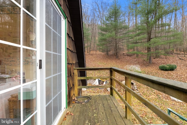 wooden terrace with a porch