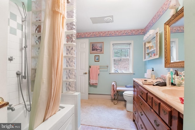 full bathroom featuring vanity, toilet, shower / tub combo, and a baseboard heating unit