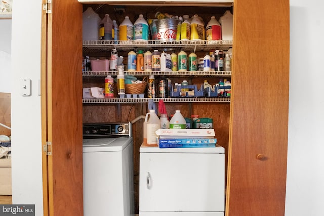 laundry area with washing machine and dryer