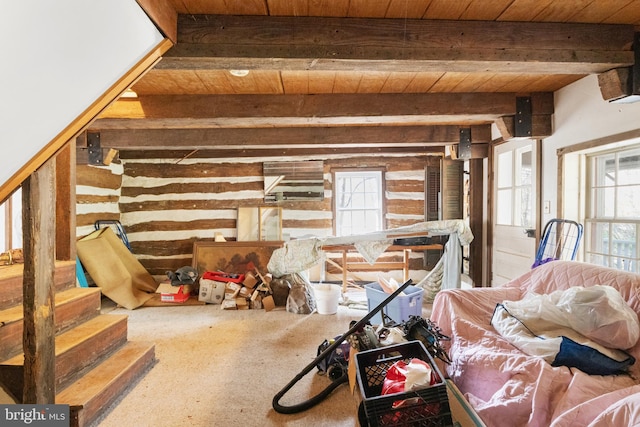 interior space with beam ceiling and wooden ceiling