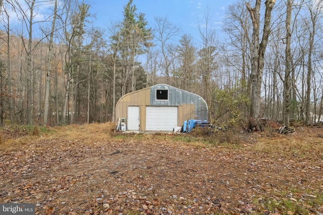 view of outdoor structure featuring a garage