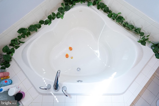 interior details with a relaxing tiled tub