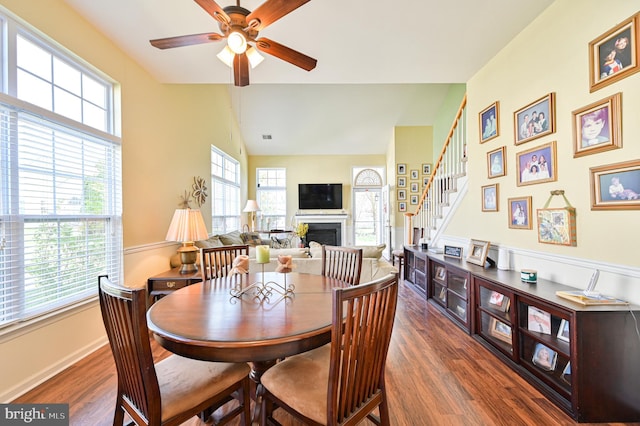 40 Vender Ln, Mays Landing, NJ 08330 - dining area with a fireplace, ceiling fan, healthy amount of natural light, wood finished floors, and vaulted ceiling
