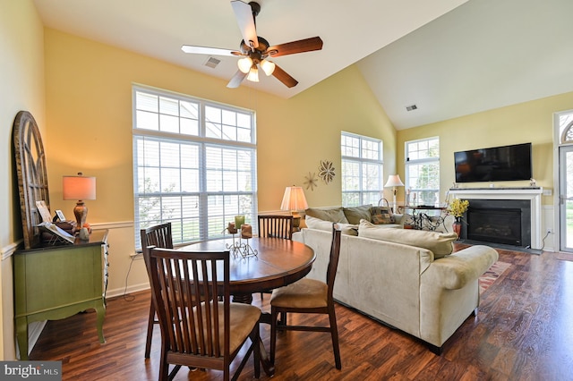 40 Vender Ln, Mays Landing, NJ 08330 - dining space featuring high vaulted ceiling, dark wood finished floors, a ceiling fan, and a fireplace with flush hearth