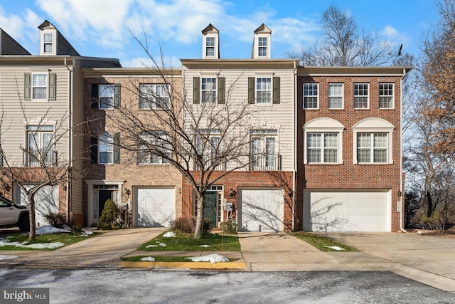 multi unit property featuring a garage